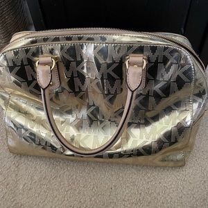 MK gold purse